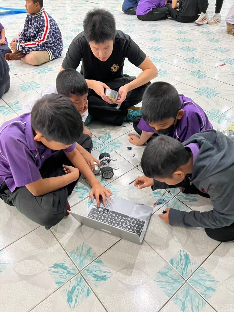 Students coding and robotics.